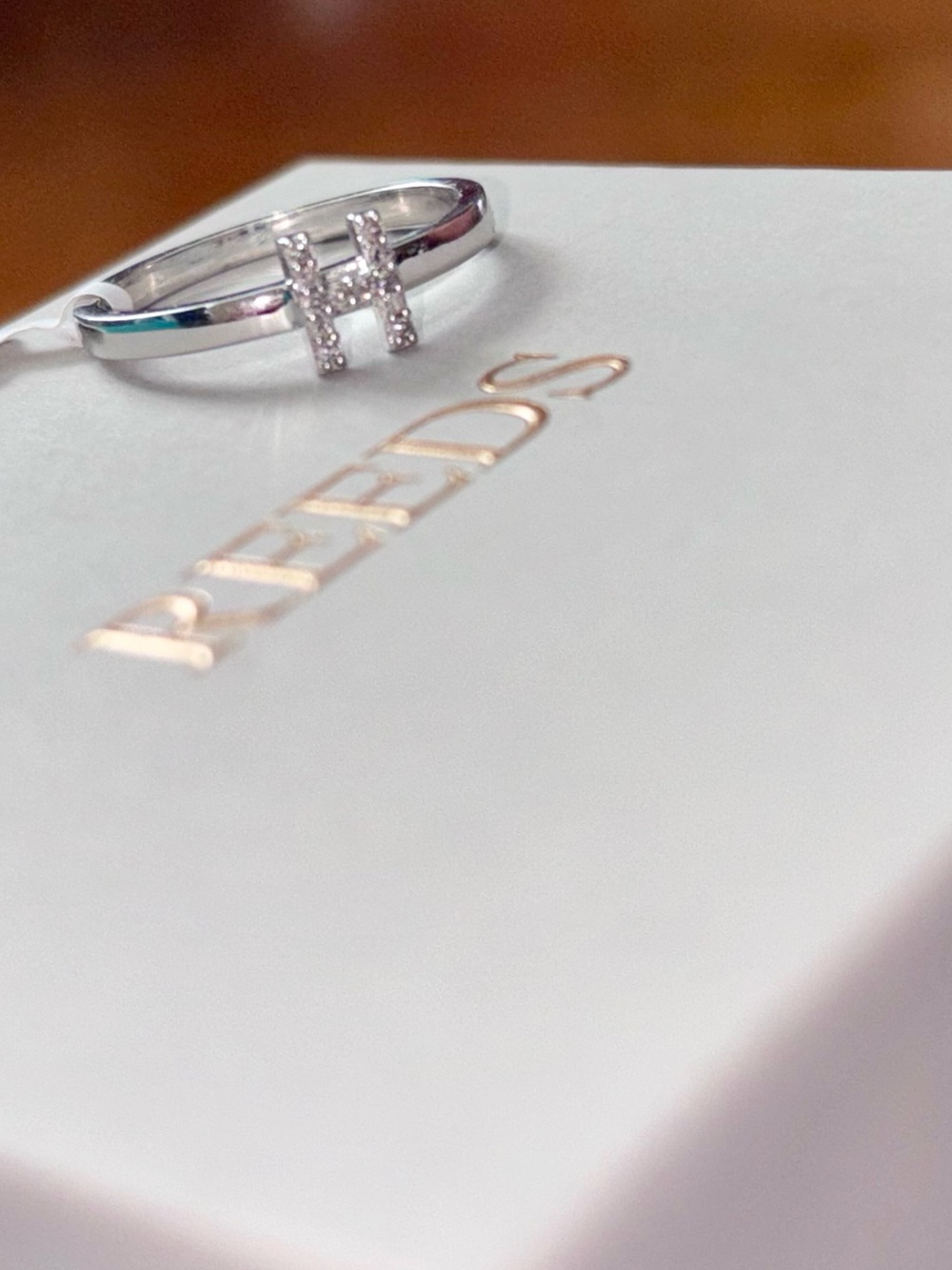 10K White Gold Diamond H Initial Band Ring 1/10ct Size 5 from Reeds Jewlers